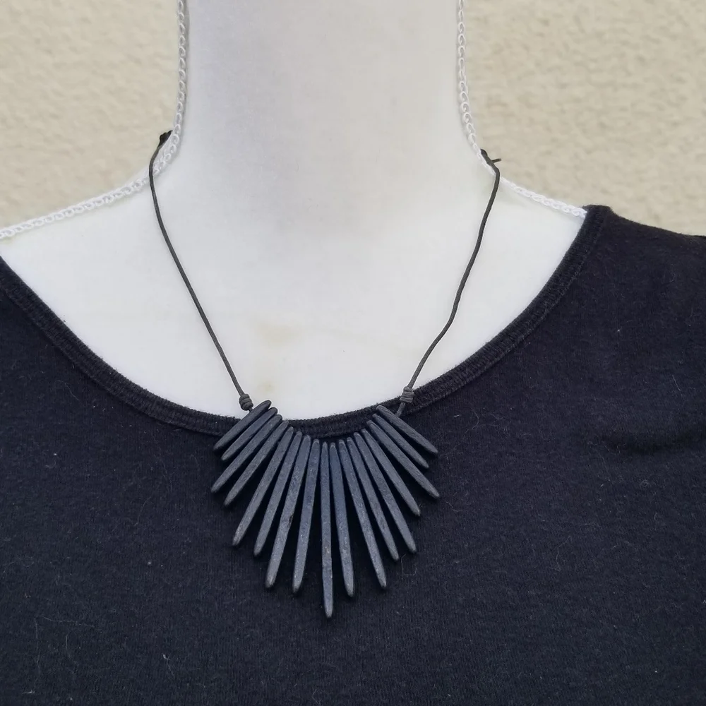 black wooden fan necklace on adjustable drawstring
